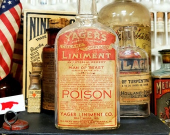 Bouteille en verre de prescription de liniment composé crémeux de Poison Yager des années 1900