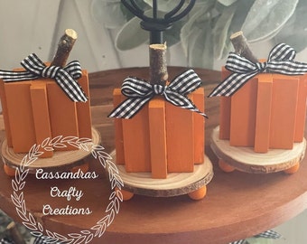 Wood Block Pumpkins w/Check Bow on Mini Wood Slice Risers (Set of 3)