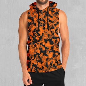 May include: A sleeveless hoodie with a black and orange camouflage pattern. The hoodie has a drawstring hood and a relaxed fit.