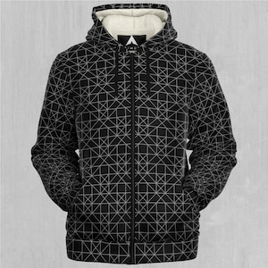 Puede incluir: Sudadera con capucha negra con cremallera y estampado geométrico blanco. La sudadera tiene forro polar y capucha con cordón.