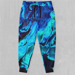 May include: Blue and green abstract print sweatpants with a black drawstring.