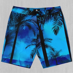 Puede incluir: Bañador azul con estampado de palmeras. El bañador tiene un cordón de ajuste negro y una cintura negra.