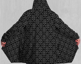 Capa com capuz forrada em sherpa para festivais rave de música eletrônica com geometria sagrada esotérica.