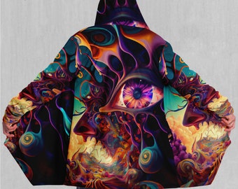 May include: A hooded cloak with a psychedelic print featuring a large eye with a purple iris and orange and blue swirls. The background is a mix of orange, yellow, and purple colors.