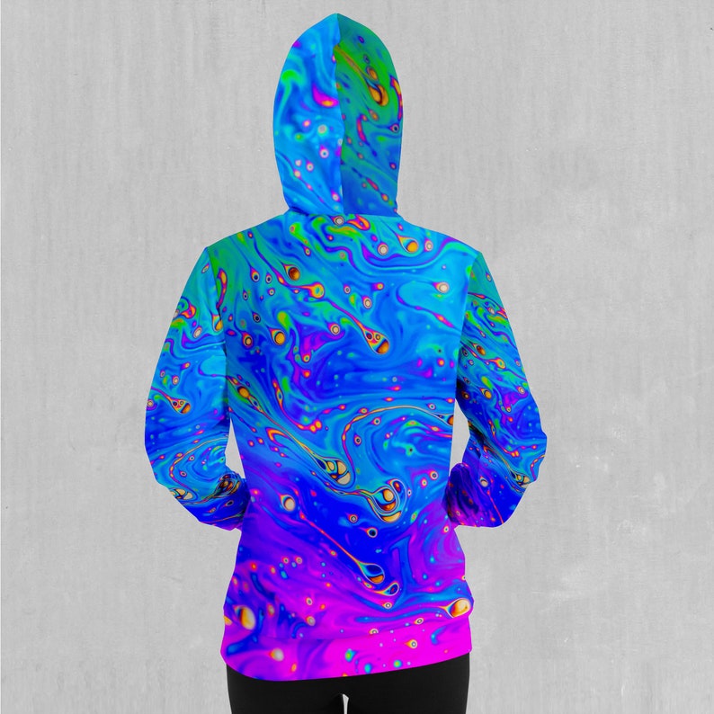 May include: A blue, green, and purple hoodie with a swirling, abstract pattern. The pattern resembles a psychedelic liquid or soap bubble.
