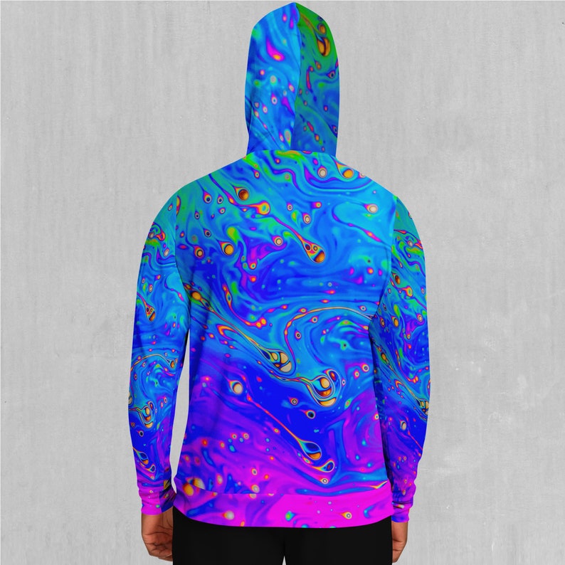 May include: A blue, green, pink, and purple hooded sweatshirt with a swirling, abstract pattern.