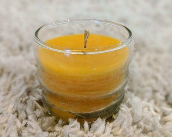 100% pure local beeswax votive candle in hive shaped glass