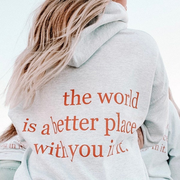 Le sweat à capuche "Le monde est un meilleur endroit avec vous"