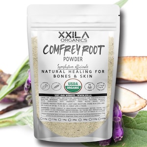 May include: A white resealable pouch with a label that reads "XXILA Organics Comfrey Root Powder Symphytum officinale Natural Healing for Bones & Skin" with a USDA Organic seal. The pouch contains a light brown powder. The label also lists ingredients and storage instructions.