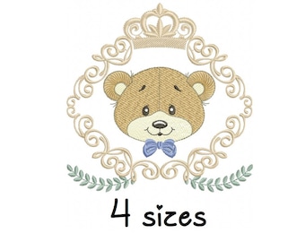 May include: Embroidered design of a teddy bear wearing a bow tie, inside a decorative frame with a crown. The design is available in 4 sizes.
