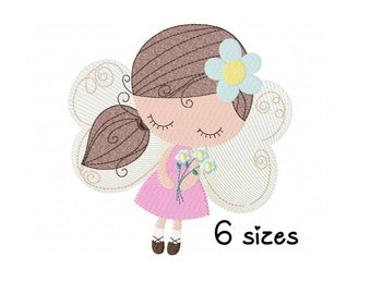 May include: Embroidered design of a girl with brown hair and a pink dress holding a bouquet of flowers. She has butterfly wings and a blue flower in her hair. The design is available in 6 sizes.