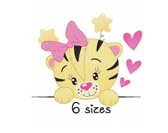 May include: Embroidered design of a cute cartoon tiger with a pink bow and stars, peeking over a banner with the text "6 sizes".