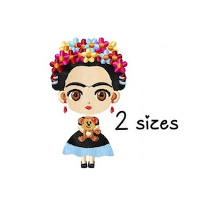 以下が含まれることがあります： 花冠をかぶった、青いドレスを着て、ぬいぐるみを持った、カートゥーンのフリーダ・カーロの刺繍デザイン。デザインは2つのサイズがあります。