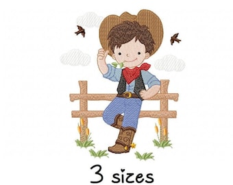 May include: An embroidered design of a young cowboy leaning on a wooden fence, wearing a brown cowboy hat, blue jeans, and a red bandana. The image includes the text "3 sizes".