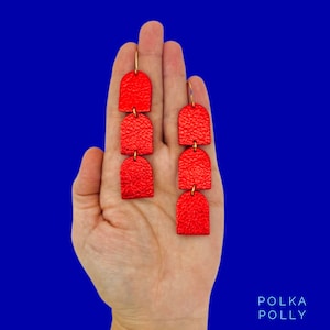 Vibrant SCOTCH RUBY RED metallic leather earrings by Polka Polly. Handmade genuine, stainless steel Brisbane