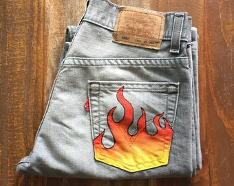 fire painting on jeans