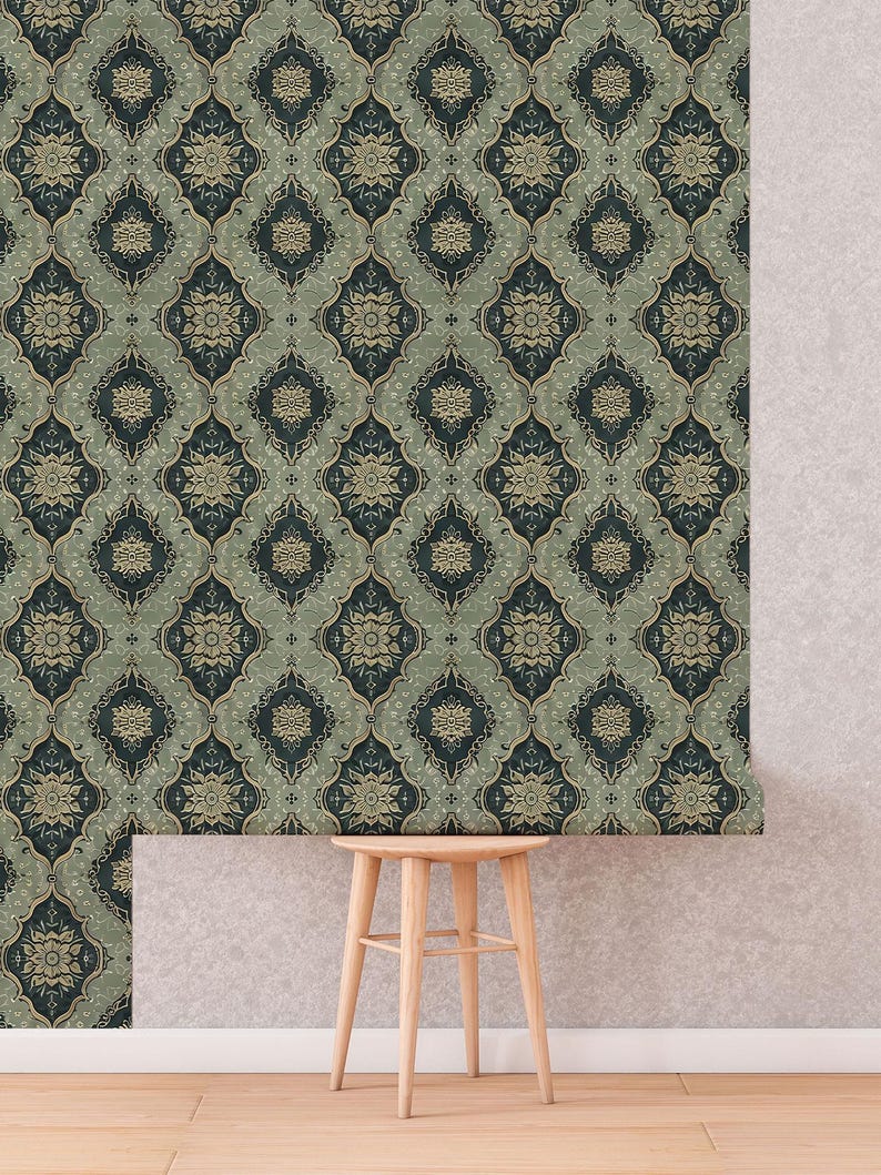 May include: A green and gold patterned wallpaper with a repeating geometric design. The wallpaper is hanging on a wall with a wooden stool in front of it.