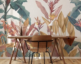 May include: A wooden desk with a brown leather bag hanging on the side. A black metal chair with a wooden seat sits in front of the desk. The desk and chair are in front of a wall with a tropical floral wallpaper.