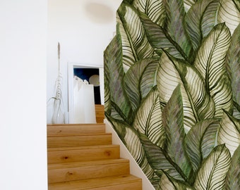 May include: A wooden staircase with a green and white tropical leaf patterned wallpaper on the wall to the right. The wallpaper features large, stylized leaves with a watercolor effect.