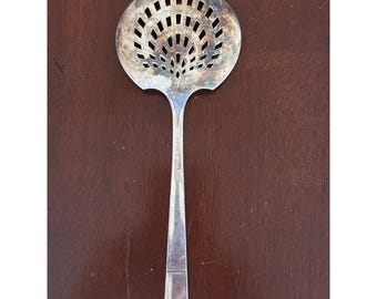 Oneida Art Déco Grenoble 1938, colher redonda perfurada para servir tomates em prata.