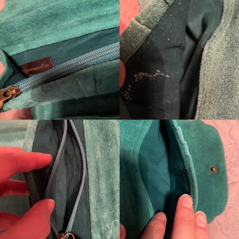 May include: A teal blue suede wallet with a zipper closure and the word "remarkable" embossed on the front. The wallet has multiple pockets and compartments.