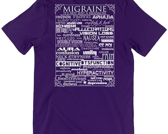 May include: A purple t-shirt with white text. The text reads "MIGRAINE IT'S NOT JUST A HEADACHE" and lists various symptoms associated with migraines. The shirt is a short-sleeved crew neck.
