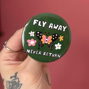 Funny Butterfly Badge – 58mm Handmade Pin with Plastic Back – “Fly Away Never Return” – Colourful Silly Joke Gift Button