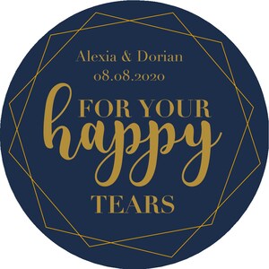 May include: A navy blue circle with a gold geometric frame. The text "Alexia & Dorian 08.08.2020 FOR YOUR happy TEARS" is written in gold lettering.