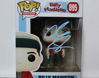 May include: A Pop! Movies vinyl figure of Billy Madison in a red shirt, blue jeans, and a white baseball cap. The figure is in a clear plastic box with a white background and the words "Billy Madison 895" printed on it.