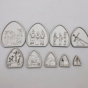 May include: Set of 10 wooden plaques with black line drawings depicting scenes from the Passion of Christ. The plaques are shaped like arches and have a white background.