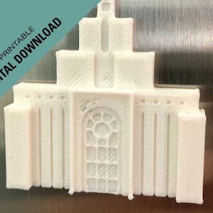 May include: A white 3D printed model of a building with a large window and a detailed facade. The model is printed in a layered style, giving it a textured appearance.