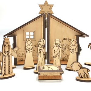 May include: A wooden nativity scene with a stable, a star, and figures of Mary, Joseph, baby Jesus, a donkey, a sheep, and palm trees.