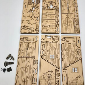 May include: A wooden nativity scene craft kit with laser-cut pieces. The kit includes a stable, a camel, a palm tree, a star, and figures of Mary, Joseph, and the baby Jesus. The kit also includes hardware for assembly.