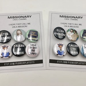 May include: Set of 6 colourful round buttons with various phrases related to missionary work. The buttons feature images of a giraffe, a temple, a person reading a book, and a person with a book. The text on the buttons includes "Sister Awesome", "Elder Amazing", "Called to Serve", "I love to see the Temple", and "Book of Mormon".