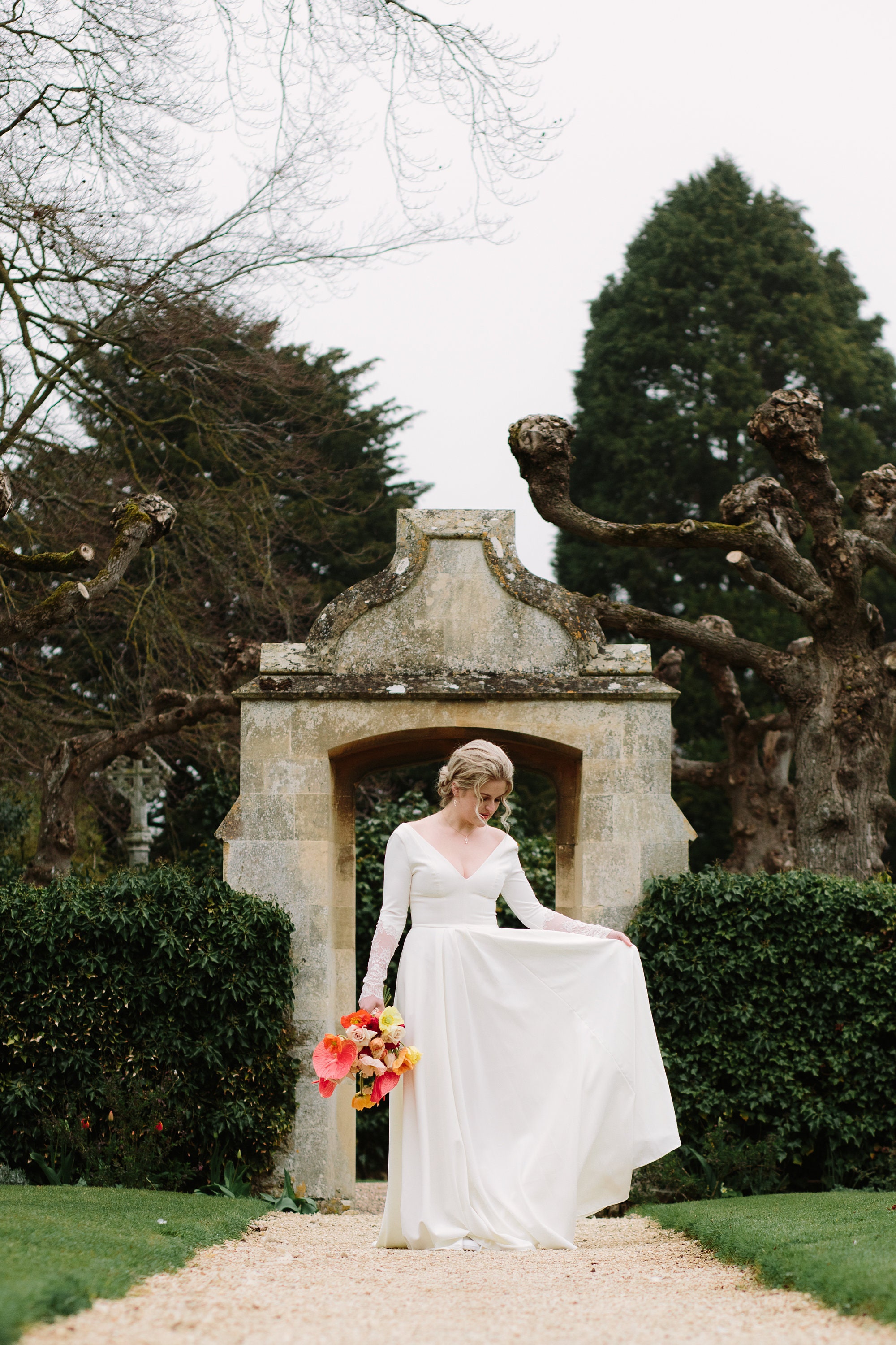 Megan wedding dress with slit and pockets .
