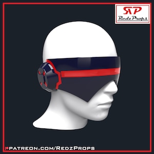 Puede incluir: Una visera azul oscuro con una franja roja horizontal en la parte frontal, que presenta componentes laterales circulares con detalles rojos. La visera se muestra sobre un maniquí blanco. El texto RedzProps y patreon.com/RedzProps es visible.