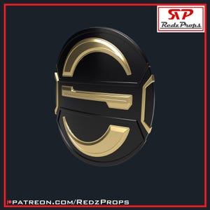 May include: A black and gold shield with a circular design. The shield features gold accents and a stylized symbol in the centre. The text "Redz Props" is in the upper right corner. The text "patreon.com/RedzProps" is at the bottom.