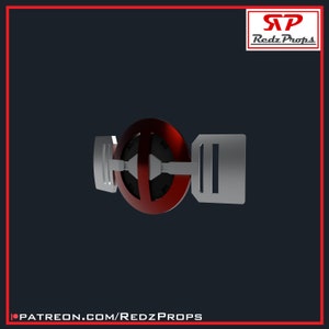 May include: A prop with a central red circular design and a black interior, with silver rectangular components on either side. The design includes the text "Redz Props" and the URL "PATREON.COM/REDZPROPS".
