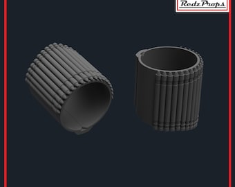 May include: Two gray 3D printed models of a cylindrical object with a series of small, cylindrical protrusions around the circumference. The object appears to be a model of a rocket launcher.