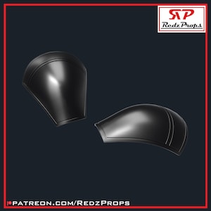 May include: Two black plastic elbow pads with a raised design. The pads are angled and have a smooth, glossy finish.