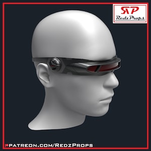 May include: A black and gray visor with red lenses, worn by a mannequin head. The visor has a circular emblem on the side and is labeled with the text "Redz Props" and "patreon.com/RedzProps".
