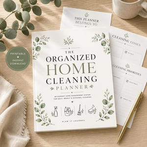 May include: A white home cleaning planner with green botanical illustrations, featuring the text THE ORGANIZED HOME CLEANING PLANNER, AN ELEGANT HOME MANAGEMENT SYSTEM FOR DAILY, WEEKLY & SEASONAL CLEANING, and PLAN IT JOURNAL, with icons of cleaning supplies.