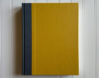 Libro de mesa de centro Plains Atlas: una pieza de estilo geográfico vintage.