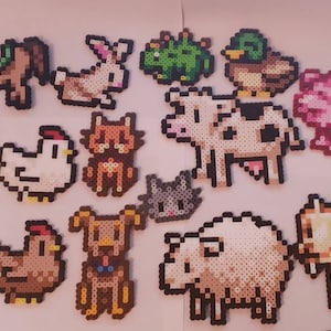 May include: A collection of pixel art farm animals, including a horse, rabbit, frog, duck, pig, chickens, cat, cow, dog, sheep, and goat. Each animal is crafted from small, colorful beads, creating a charming, retro aesthetic.