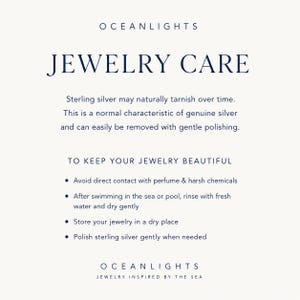 May include: An informational card titled OCEANLIGHTS JEWELRY CARE. It explains that sterling silver may tarnish and provides instructions: avoid perfume and chemicals, rinse after swimming, store in a dry place, and polish gently when needed.