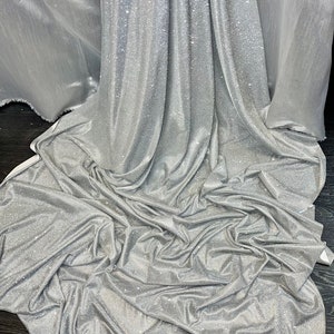 1m metalic   / white silver sparkly Lurex moonlight  slight strech fabric 58" wide