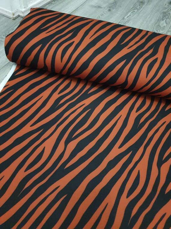 1m animal print terecotta orange black zebra  fabric 58" wide
