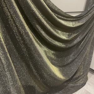 1m Lurex black /gold glitery  sparkly moonlight  slight strech nylon fabric 58&quot; wide
