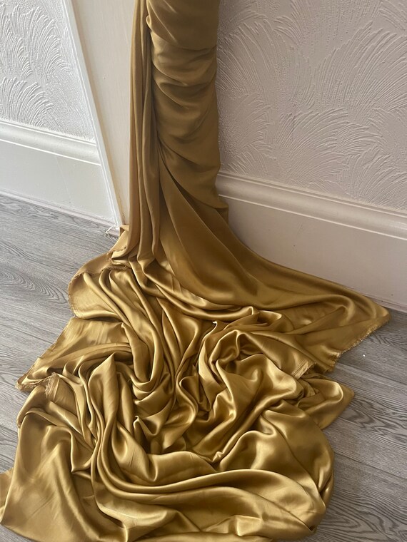 joan collins gold dress Silk Embroidered Yellow Unstitched Dress Material With Dupatta – Salwar  Studio main image 1