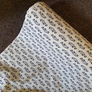 1m ivory  colored car  print  100% cotton 45" wide